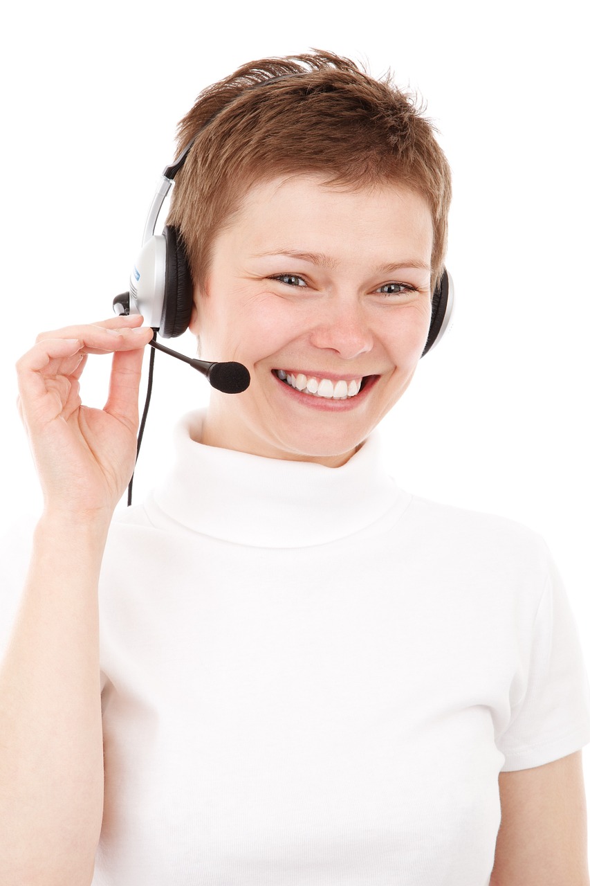 Customer Support Agent with Headset Female customer service support agent wearing a headset, ready to assist.